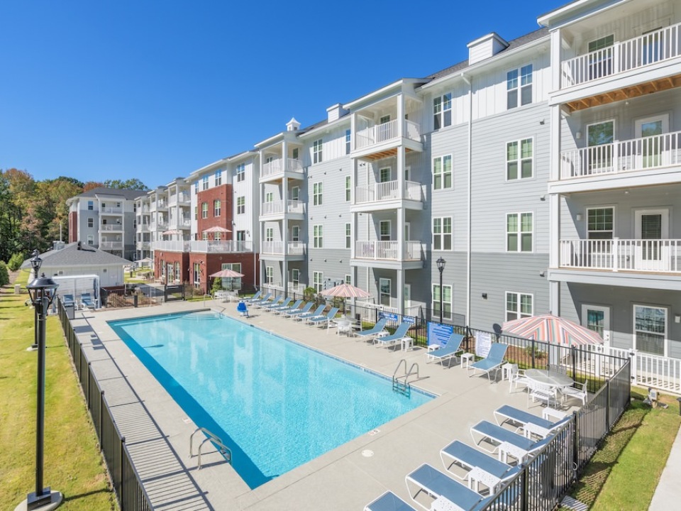 Large sparkling blue swimming pool 
